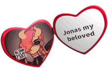 a heart shaped mirror with the words jonas my beloved on it