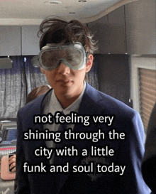 a man wearing a suit and goggles with the caption not feeling very shining through the city with a little funk and soul today