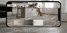 a phone screen shows a woman petting a dog and the words tenacity room visualizer on the bottom