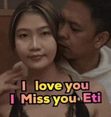 a picture of a man kissing a woman with the words i love you i miss you 's eti