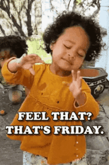 a little girl is making a peace sign with her hands and the words `` feel that ? that 's friday '' .