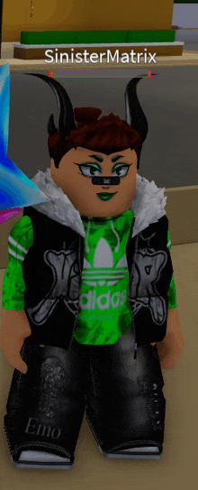 a person with horns and a green adidas shirt