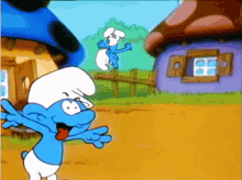 two smurfs are standing in front of a house