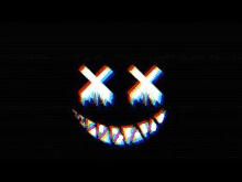 a glowing smiley face with crossed eyes and sharp teeth .