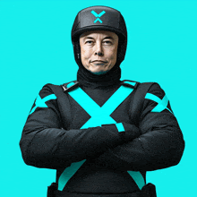 a man wearing a helmet with a x on it