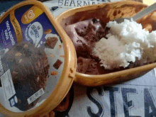 a bowl of ice cream with a spoon in it