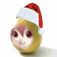 a pear with a santa hat on it .