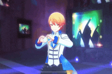 a boy is making a heart shape with his hands in a video game while standing on a stage .