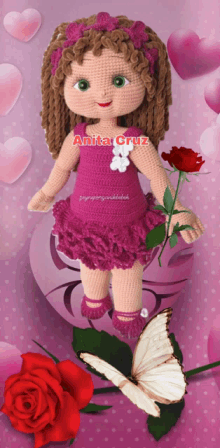 a crocheted doll with the name anita cruz on her chest