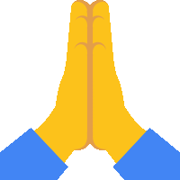 a person 's hands folded in prayer with a blue shirt