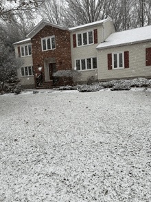 a large house with a lot of snow on the ground