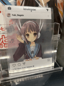 a picture of a girl with headphones and the name yuki_nagato on it