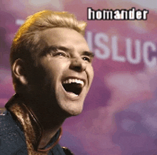 a man is laughing in front of a sign that says homander sluc