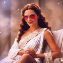 a woman in a white dress and red sunglasses is sitting on a couch