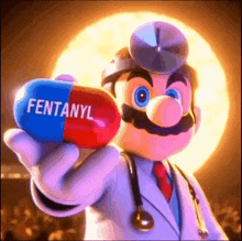 a doctor with a stethoscope is holding a capsule that says fentanyl