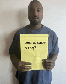 a man is holding a piece of paper that says pedro cadé o rpg