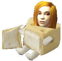 a woman is sitting inside of a block of cheese