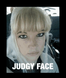 a picture of a woman with the words judgy face on it