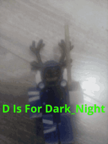 a blurred image of a person with antlers and the words " d is for dark night "