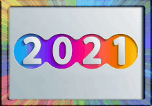 the year 2021 is displayed in a colorful circle