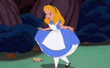 alice from alice in wonderland is wearing a blue dress