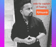 a man is standing in front of a sign that says vote for captain of feeling rjmayank