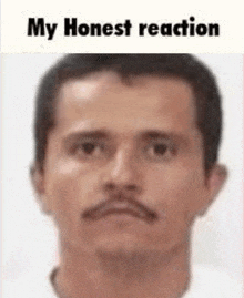 a close up of a man 's face with the words `` my honest reaction '' above it .