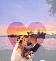 a bride and groom are kissing in front of a heart shaped lake