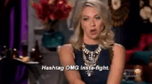 a woman is wearing a necklace and says hashtag omg insta-fight