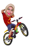 a woman wearing a hijab is riding a bicycle with a yellow rim