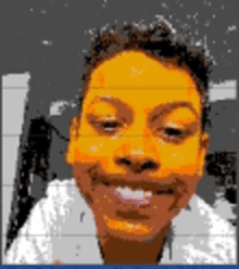 a pixelated image of a person 's face with a gray background