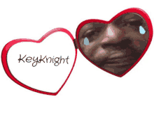 a heart shaped mirror with the words keyknight on it