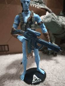 a figurine of avatar holding a rifle