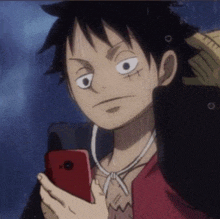 monkey d luffy from one piece is holding a red cell phone in his hand .