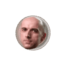 a bald man 's head is visible in a circle on a white background