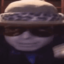 a cartoon character wearing a hat and sunglasses .