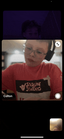 a boy wearing a red shirt that says stateline students is on a video call