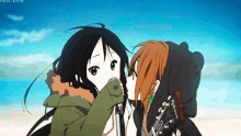 a couple of anime girls kissing each other on the beach