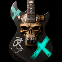 a black guitar with a skull on it and a cross on it