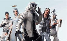 a group of people are standing next to each other in a video game called fortnite .