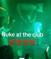 a picture of a man holding a bomb with the words " nuke at the club "