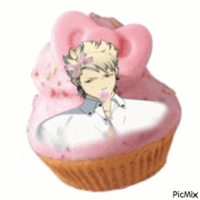 a cupcake with a picture of a man in it