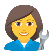 a woman in a blue shirt is holding a wrench in her hand