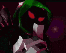 a cartoon character with a green hood and red eyes is standing in the dark .