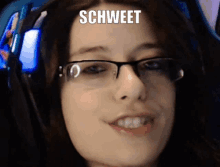 a close up of a woman wearing glasses with schweeter written on the bottom