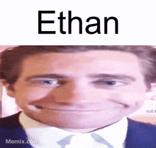 a close up of a man 's face with the name ethan written above him