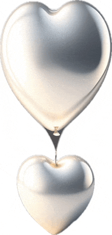 two silver hearts with a drop of liquid coming out of them