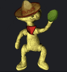 a stuffed animal is wearing a sombrero and holding a green ball