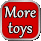 a red square button with the words `` more toys '' on it .