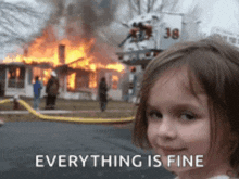 a little girl is smiling in front of a burning house and the words everything is fine